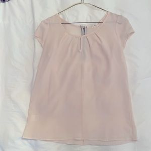 Super cute top. Size small. Could be business casual or for a night out.